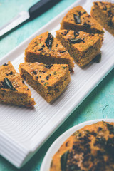 Handvo/handwa is a vegetable cake originating from the Gujarat, India. selective focus