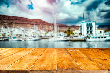 Desk of free space for your decoration and summer background of beach. 