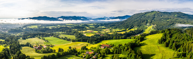 Aerial Bad Toelz Bavarian Alps. Golf Course. Blomberg Mountain. Morning Drone Shot with some clouds...