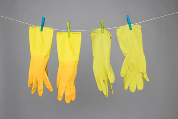 Hanging yellow rubber marigold gloves