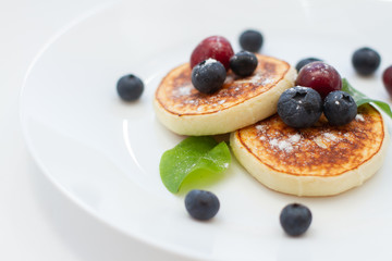 puncakes with fruits and berries
