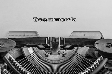 ETeamwork is printed on a vintage typewriter.
