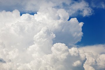Clouds and bright blue sky background