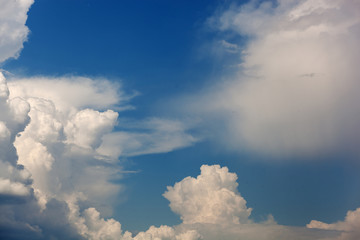 Fototapeta na wymiar Clouds and bright blue sky background