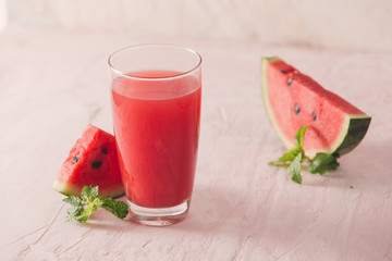 Watermelon drink in glasses with slices of watermelon
