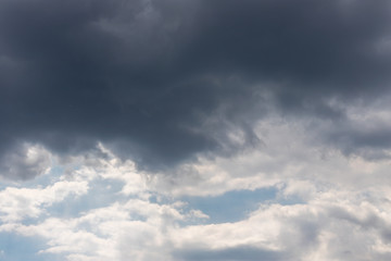 Grey clouds against a grey sky.