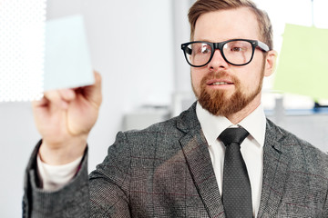 mid age businessman working on new project at modern office