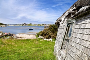 Fototapeta premium Ruins of a 200 year old home, left to rot by the ocean.