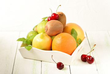 The mixed fruit on a tray vitamins