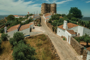 Fototapeta na wymiar Empty street and Castle at Evoramonte