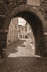 Arched door in stone wall at the Castle of Estremoz