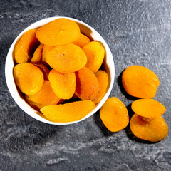 Soft Dried Apricots In A White Bowl