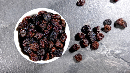 Looking Down On A Bowl of Dried Raisins Fruit