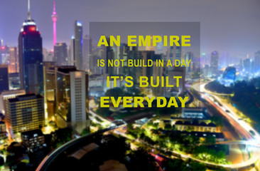 Motivation quote with the night scene of metropolitan city blur background. An empire is not built in a day. It's built everyday