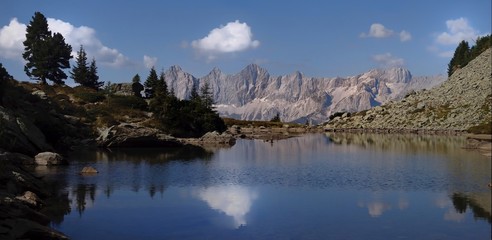 Naklejka na ściany i meble Scenic mountain landscape with mountain lake