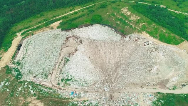 Flight over open cast mines. Illegal duming, Fly-tipping. 4K.