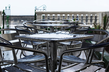 tables in the rain