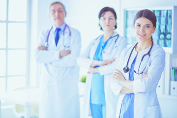 Fototapeta premium Group of doctors and nurses standing in the hospital Accident and Emergency department