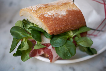 Sandwich with coppa and baby lettuce