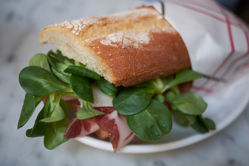 Sandwich with coppa and baby lettuce