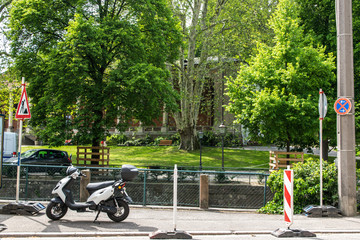 Obraz premium Scooter on the street in city.