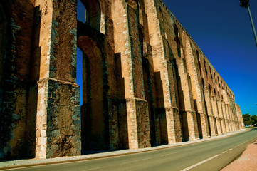 Architectural structure of the aqueduct with arches on the road to Elvas