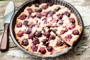 Cherry pie with crumble in vintage form 