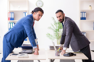 Two male colleagues in the office 