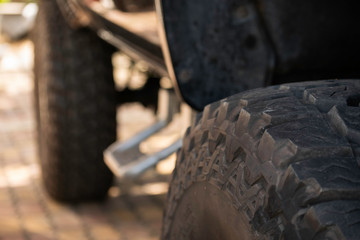 Close up of big tire track  off raod.