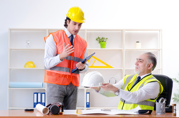 Two engineers colleagues working under project 