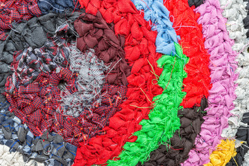 Handmade colored carpets close up.