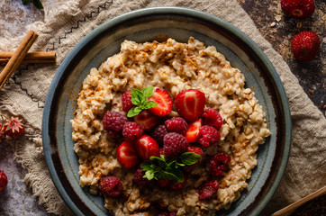 Homemade porridge with forest berries