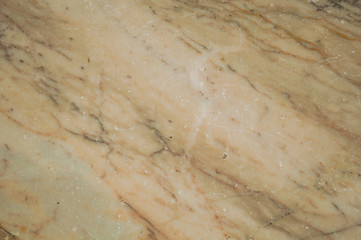 Marble surface with veins and some cracks and chipped