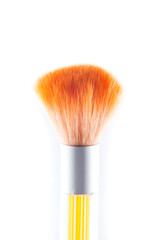 face brush for applying makeup powder on a white background