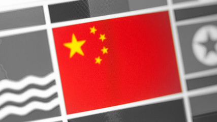 China national flag of country. China flag on the display, a digital moire effect.