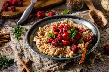 Homemade porridge with forest berries
