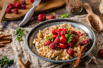 Homemade porridge with forest berries