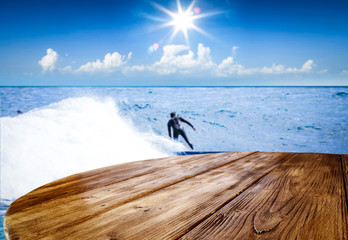 Desk of free space and summer background of beach 