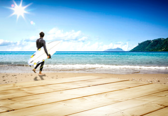 Desk of free space and summer background of beach 