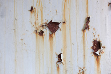 Bright rust stains texture paint showing through to rust underneath