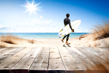 Desk of free space and summer background of beach 