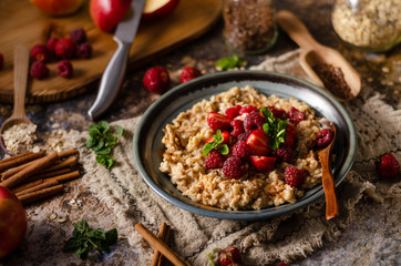Homemade porridge with forest berries