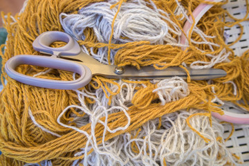 Needlework, the background of the thread and scissors