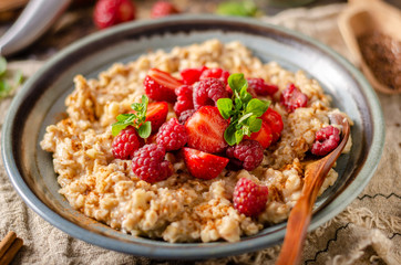 Homemade porridge with forest berries