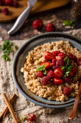 Homemade porridge with forest berries