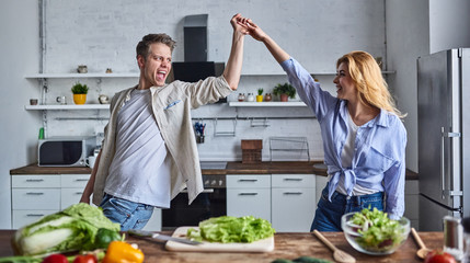 Young couple in the kitchen