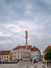 Fototapeta na wymiar Column of the Virgin Mary and Baby Jesus in the Main Square of Gyor Hungary