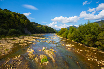 river rushing through the mountain valley