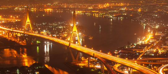 Fototapeta na wymiar Aerial view of Bhumibol Suspension Bridges and highways interchange.