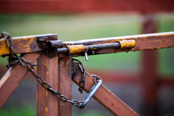 padlock and chain on fence